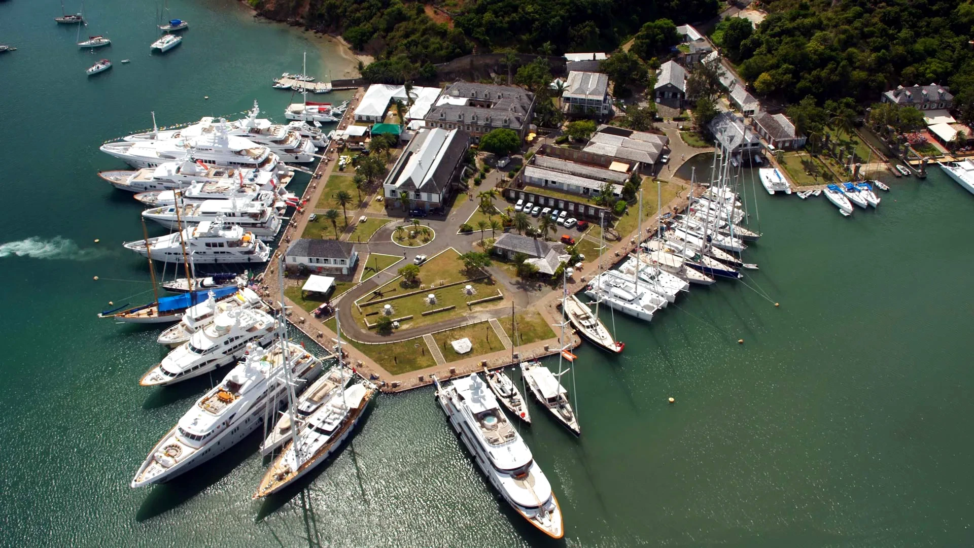 Aerial view of English Harbour, Antigua — Nelson's Dockyard from Shirley Heights, yachts anchored in the protected bay.